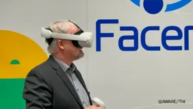 Prof. Harald Göllinger tries out VR glasses at FACENS Centro Universitário